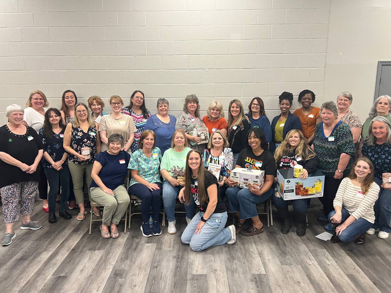 Friends gathered together for a Bunco night group photo