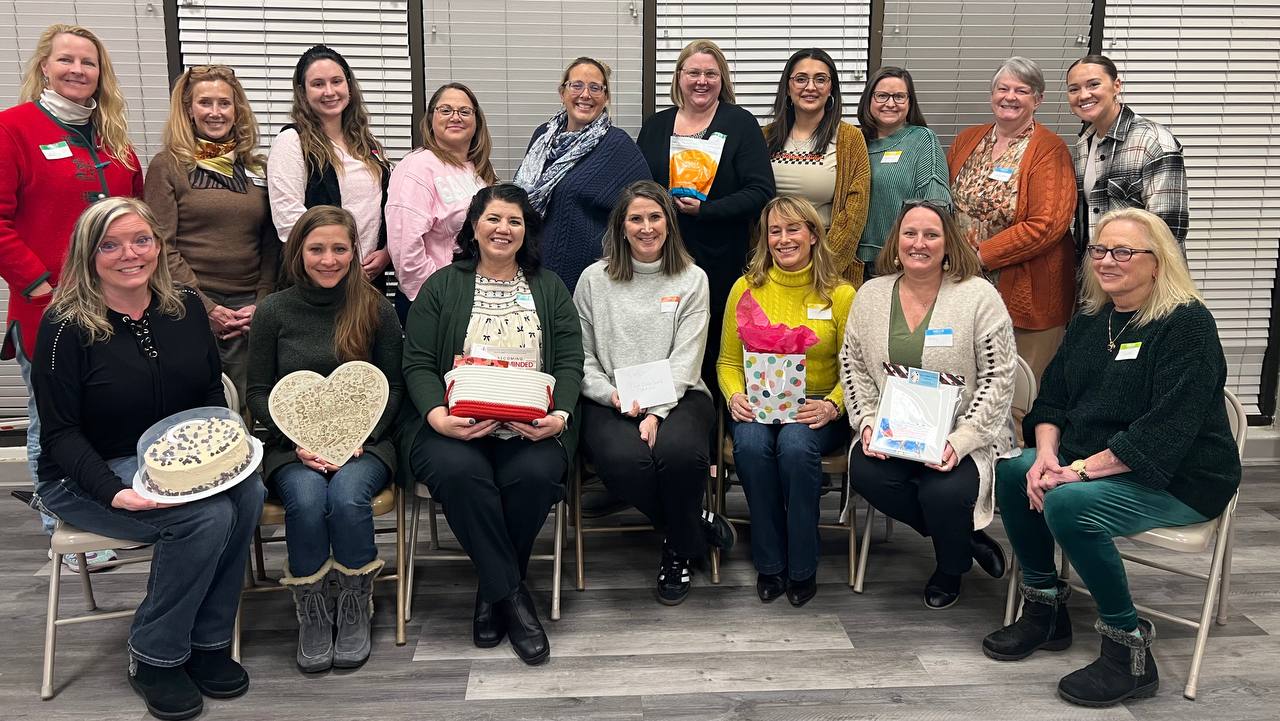 Friends gathered together for a Bunco night group photo